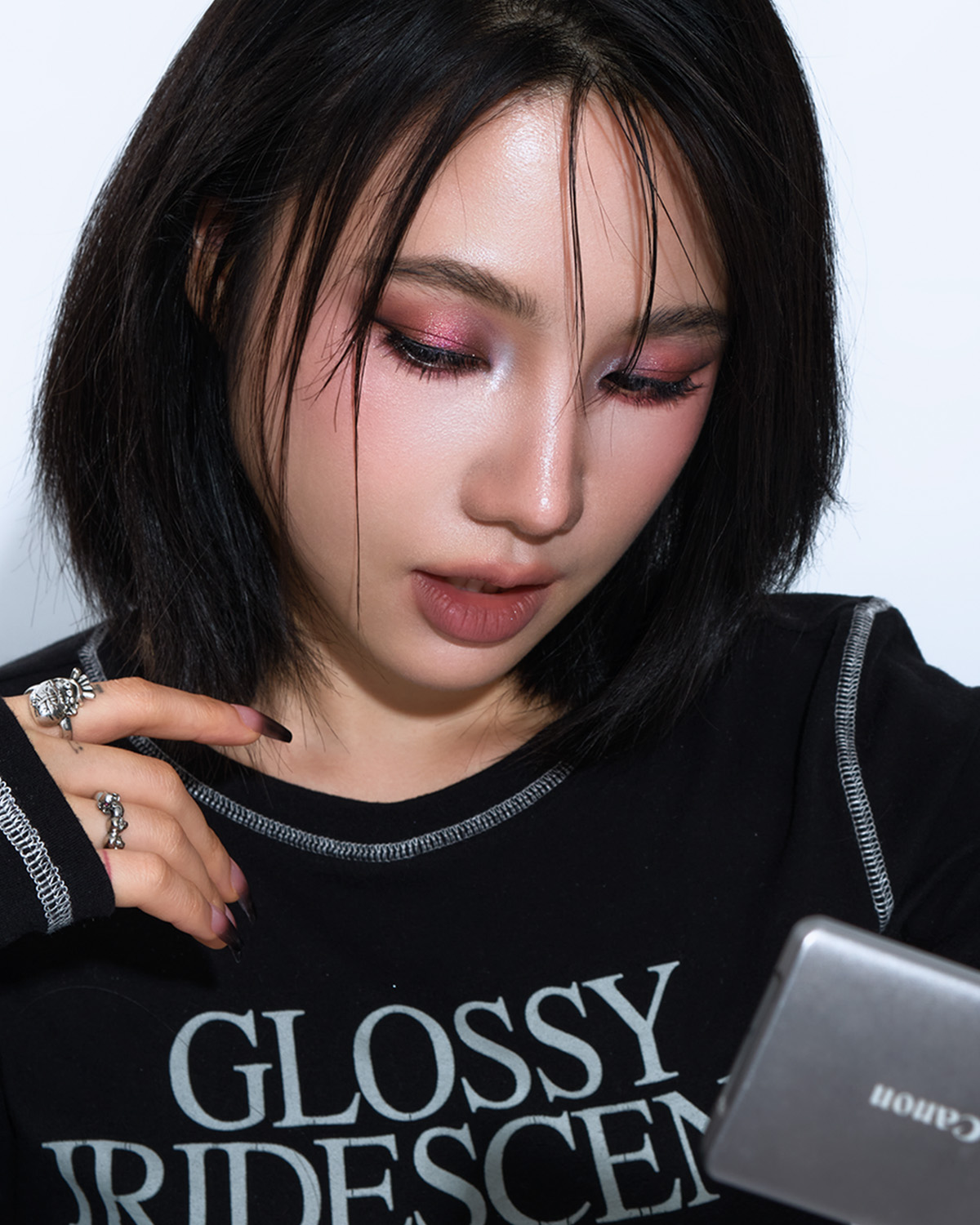 K-Pop Stage — looking into compact mirror