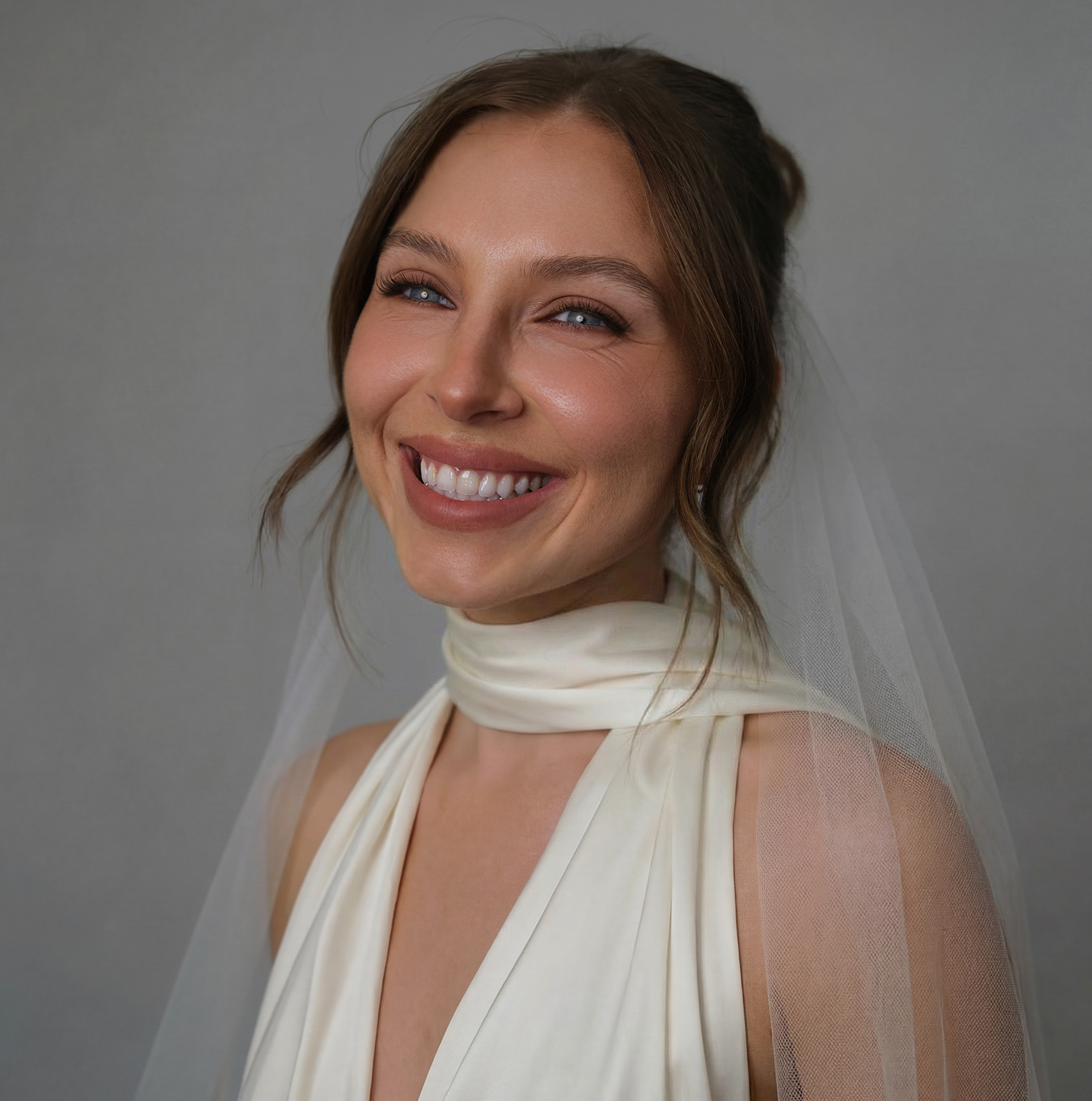 Bridal — natural radiant smile, veil