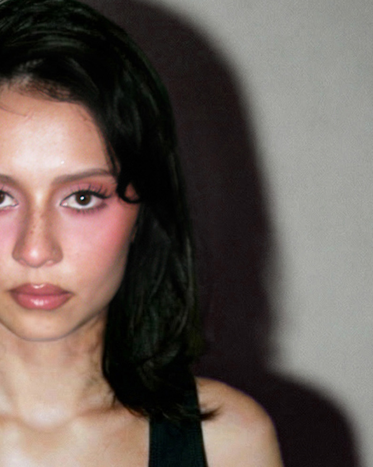 Bold Eye — dark moody half-face portrait